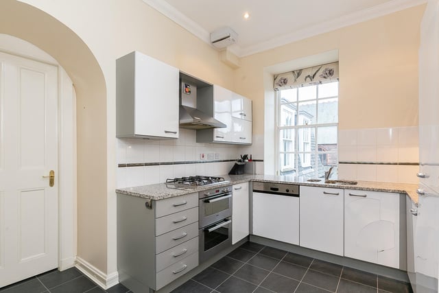 There is a fitted kitchen with appliances, good quality bathrooms, extensive and mixed lighting, gas central heating and leafy views to both aspects.
