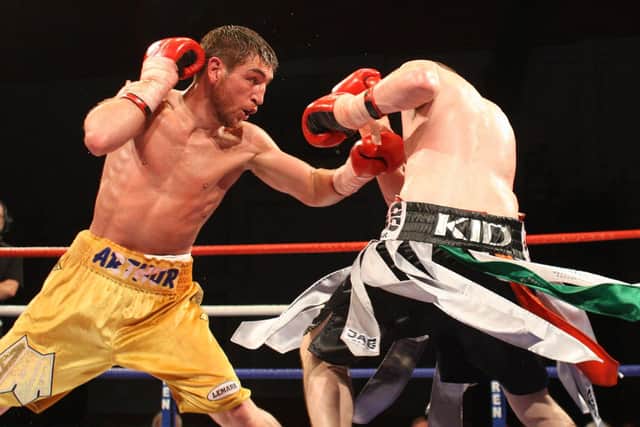 Alex Arthur, left, in action against Peter McDonagh at Glasgow's Kelvin Hall in 2010 (Picture: Lynne Cameron/PA)