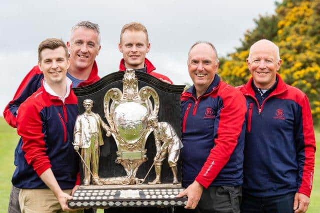 Mortonhall team members, from left, Alex Main, Graeme Clark, Steven Scott, Ian Dickson and Duncan Hamilton show off the Dispatch Trophy after a successful defence at the Braids in 2019. Pic: Ian Georgeson