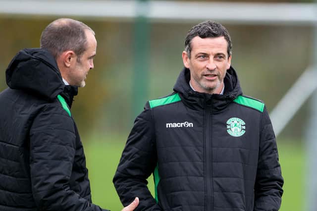 Jack Ross deep in discussion with assistant John Potter at the Hibernian Training Centre