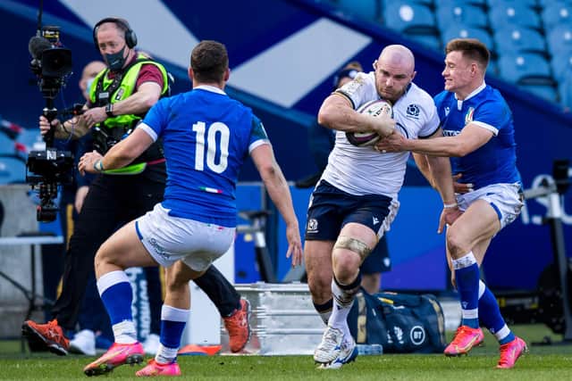 Dave Cherry on the rampage. The hooker scored two tries on his first start for Scotland. Picture: Ross Parker/SNS