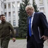 Handout photo issued by the Ukrainian Presidential Press Office of Prime Minister Boris Johnson (right) meeting Ukrainian President Volodymyr Zelensky in Kyiv, Ukraine. Picture date: Saturday April 9, 2022.