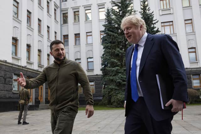 Handout photo issued by the Ukrainian Presidential Press Office of Prime Minister Boris Johnson (right) meeting Ukrainian President Volodymyr Zelensky in Kyiv, Ukraine. Picture date: Saturday April 9, 2022.