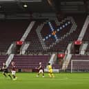 Hearts match against Ross County at Tynecastle on Boxing Day was played behind closed doors after the introduction of crowd restrictions - one of many sporting fixtures affected. (Photo by Paul Devlin / SNS Group)