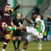 Lawrence Shankland and Rocky Bushiri battle for possession in the last Edinburgh derby. Picture: SNS