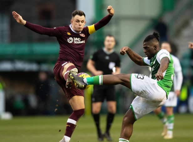 Lawrence Shankland and Rocky Bushiri battle for possession in the last Edinburgh derby. Picture: SNS
