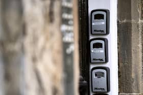 Key safes outside blocks of flats are a common sight across swaths of Edinburgh. (Picture: Lisa Ferguson)