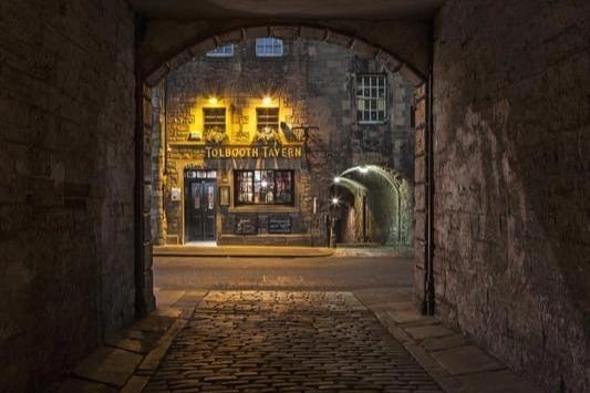Serving as a police station and prison during its life, this pub is said to be haunted by the evil spirit of a man held prisoner. Employees report drinks and picture frames being thrown and hearing children's voices and footsteps.