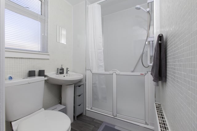 The three-piece modern bathroom suite which has been upgraded and well maintained by the owners.