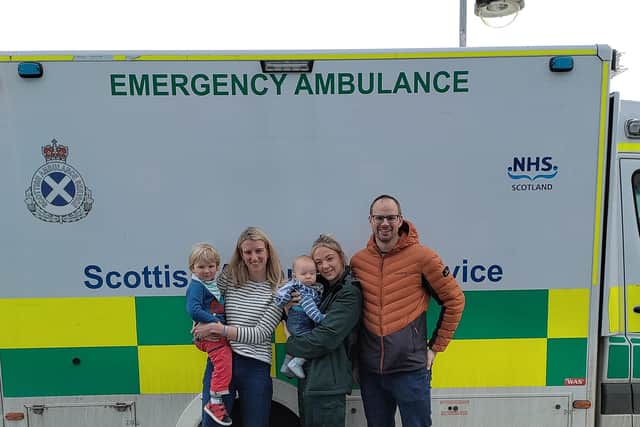 Max (left), Alex Clayton (centre-left), Fraser (centre) and Tony Hayward (right) meeting up with ambulance service call handler Lorna Milward (centre-right), who helped deliver baby Fraser when he was born prematurely while they holidayed in Scotland.