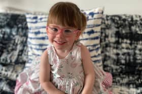 Two-year-old Harlow Kean can play with her toys again thanks to new glasses.
