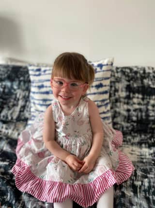 Two-year-old Harlow Kean can play with her toys again thanks to new glasses.