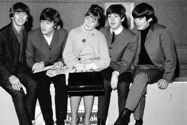 A female fan gets to meet the Beatles at the ABC cinema in Edinburgh in 1964.