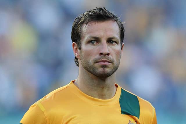 Australia captain Lucas Neill lines up ahead of a Socceroos friendly match against Costa Rica in November 2013