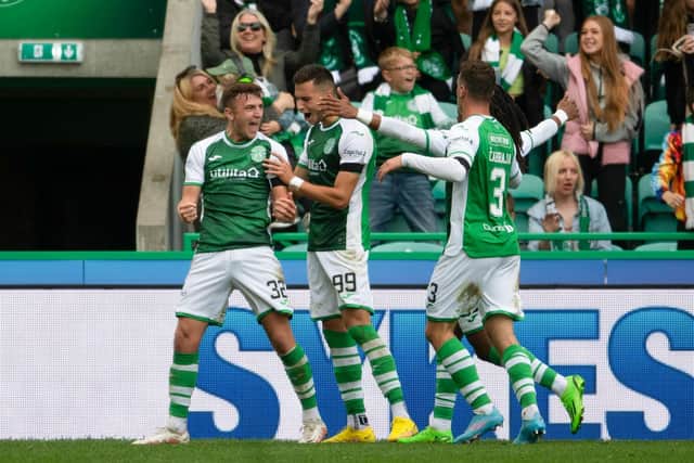 Campbell celebrates scoring his second and Hibs' third against Aberdeen with Mykola Kukharevych, Jair Tavares (partially hidden) and Marijan Cabraja