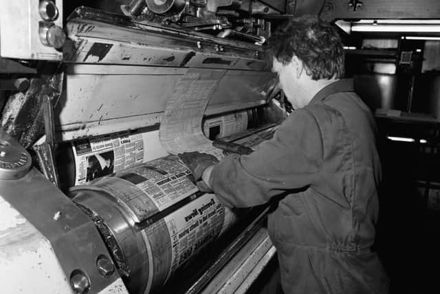 Plates are fitted to the presses all ready for printing the Evening News in the printing plant below the paper's offices at North Bridge in June 1989.  Picture: Norman Wilson..