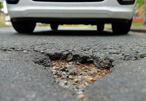 Transport convener Scott Arthur says an extra £8m is needed to halt the decline in the condition of the Capital's roads.
