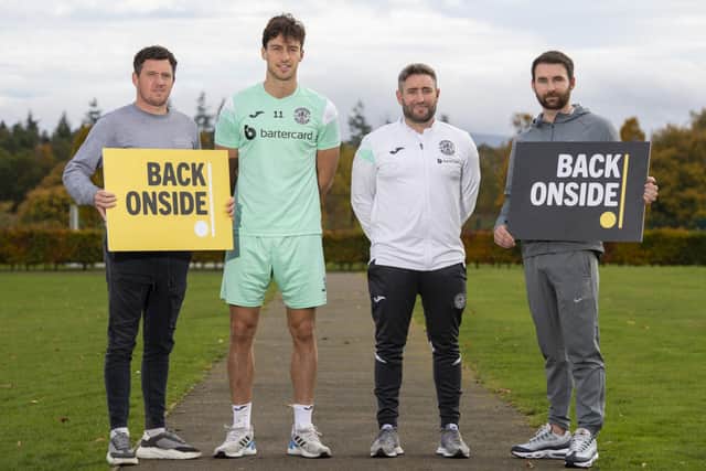 Hibs midfielder Joe Newell and manager Lee Johnson are joined by Back Onside ambassadors Danny Swanson, left, and James Keatings to launch a partnership between the club and charity
