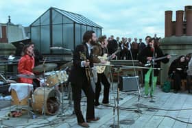 Ringo Starr, Paul McCartney, John Lennon, and George Harrison in The Beatles: Get Back