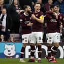 Jorge Grant celebrates with his Hearts team-mates after making it 3-0 to the hosts against St Johnstone. Picture: SNS