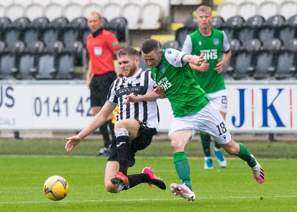 Jamie Murphy vies for the ball with Marcus Fraser during Hibs' 3-0 win at St Mirren