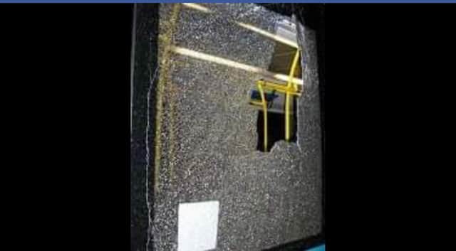 Police released this image of a shattered bus window in West Lothian following a number of "extremely dangerous" attacks in recent weeks. PIC: West Lothian Police/FB.
