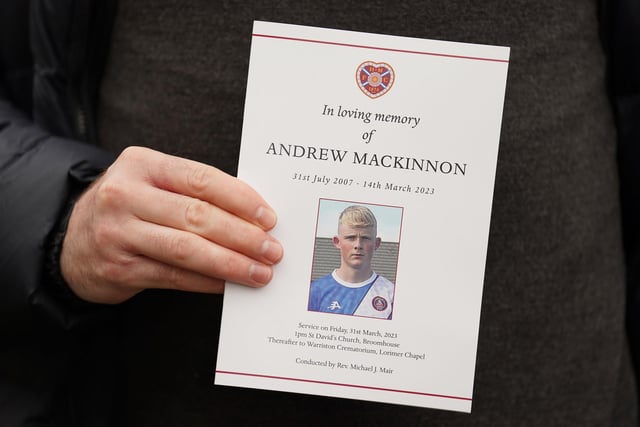 An order of service is held at the funeral of Andrew MacKinnon at St David's Church, Edinburgh.