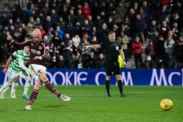 Hearts striker Liam Boyce strikes his penalty against Celtic. Picture: SNS