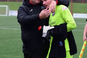 Dunbar boss Kevin Haynes celebrates with goalkeeper Shea Dowie after their 3-0 win [Pic: Dunbar United]