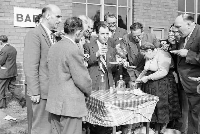 Mrs Beggie sells mussels at Musselburgh Races in September 1958.