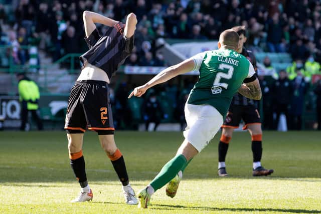 Harry Clarke wheels away in delight after taking full advantage of an error from Dundee United defender Liam Smith during Hibs' 1-1 draw at Easter Road. Picture: SNS