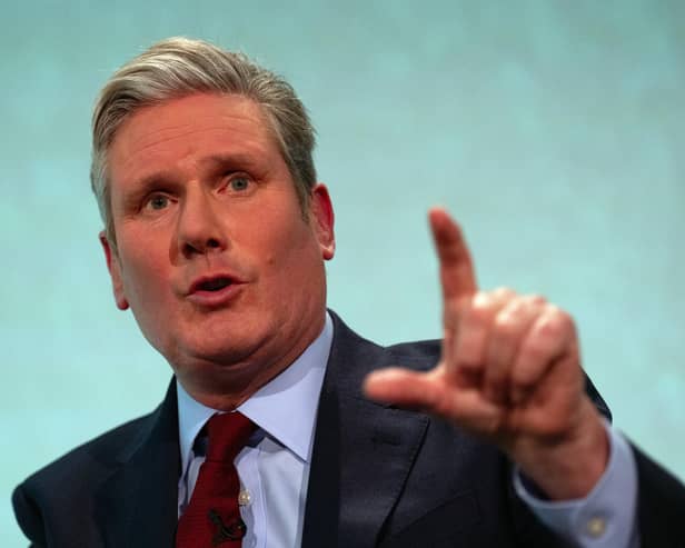 Britain's opposition Labour Party leader Keir Starmer speaks at the Queen Elizabeth II Conference Centre yesterday