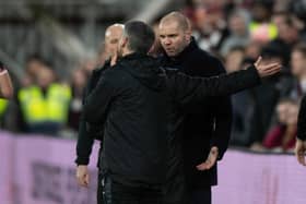 Hearts manager Robbie Neilson argues with the fourth official and is shown a red card against St Mirren.