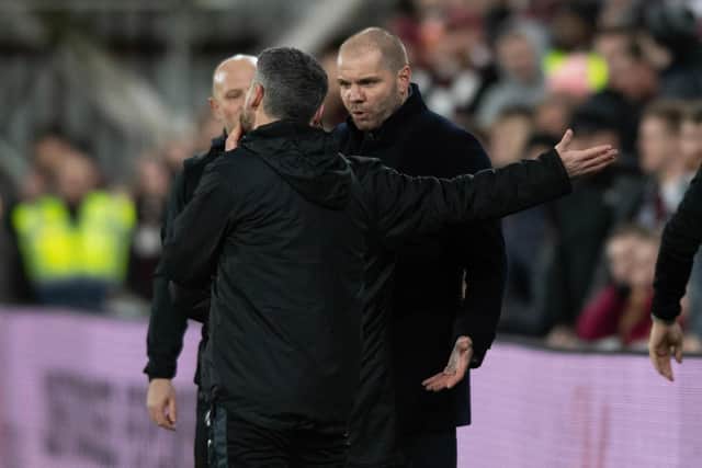 Hearts manager Robbie Neilson argues with the fourth official and is shown a red card against St Mirren.