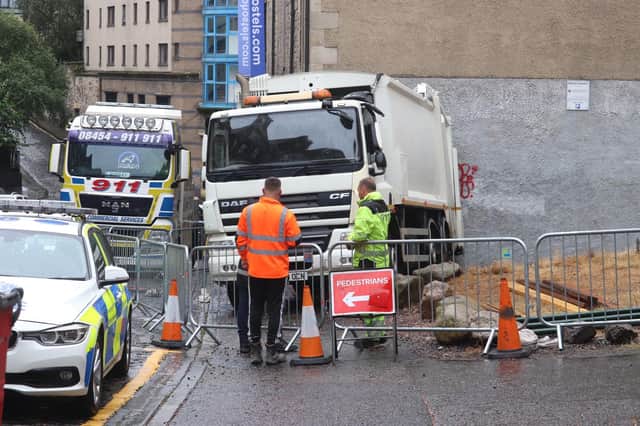 The unattended bin lorry crashed into the wall of a city centre hostel on Saturday morning.