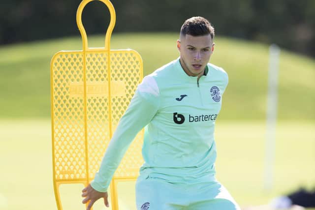 Mykola Kukharevych takes part in Hibs training at HTC