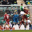 Ryan Porteous rises highest to score the only goal of the game as Hibs defeat Aberdeen in Shaun Maloney's first match in charge. Picture: SNS