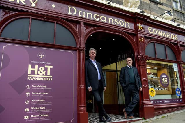 Original owner and landlord Edward Fox has passed the keys to Jon Adnitt, H&T's property director
Edward Fox, original owner oof Duncan and Edwards and landlord, JOn Adnit Property Director of H & T Pawnbrokers
Duncanson & Edwards pawnbroker
is being taken over by Harvey & Thompson pawnbrokers
