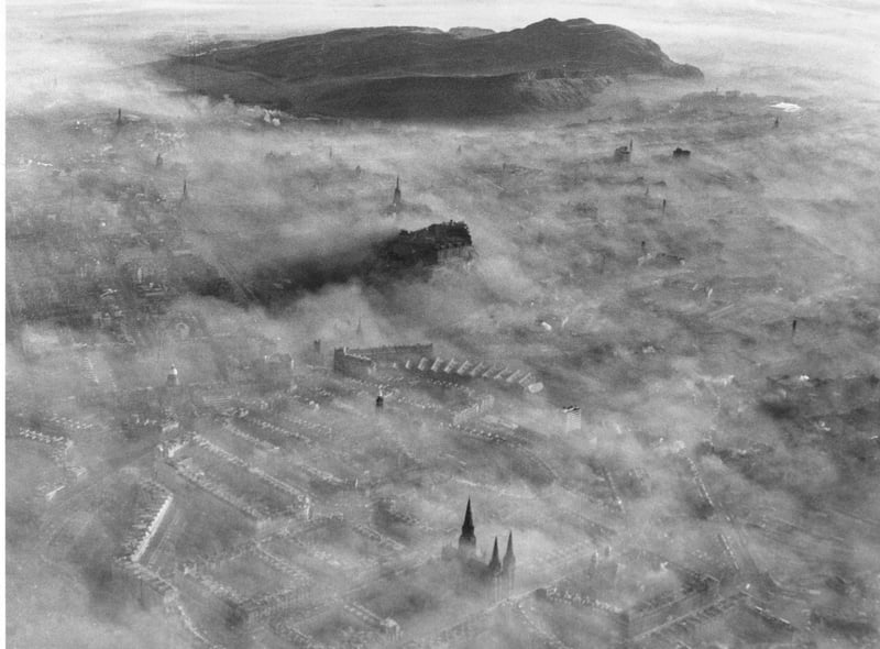 This incredible aerial photo of early morning mist in the Capital was taken in 1969.