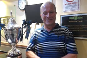 Greig Hutcheon poses with the Deer Park Masters trophy after his latest victory at the Livingston course. Picture: PGA in Scotland