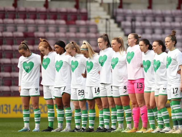 Hibs Women players pay tribute to Ron Gordon during a minute's silence ahead of the Capital Cup clash with Hearts at Tynecastle. Picture: Michael Hulf
