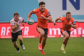 Edinburgh stand-off Blair Kinghorn breaks forward with support from Ben Vellacott during the 15-9 defeat by Emirates Lions at Ellis Park. Picture: David Gibson/Fotosport/Shutterstock