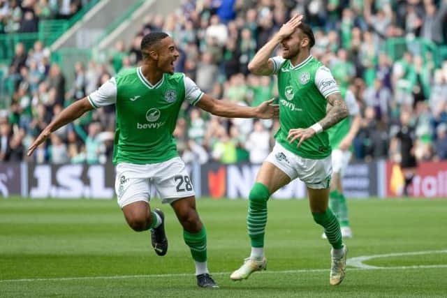 Martin Boyle celebrates with Allan Delferrière after putting Hibs 2-0 up on the night. Picture: SNS