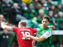 Joe Newell in the thick of it against Aberdeen as he challenges Dons midfielder Lewis Ferguson