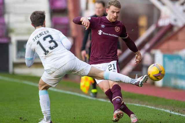 Hearts full-back Stephen Kingsley and Raith Rovers midfielder Brad Spencer in action during Saturday's meeting at Tynecastle. The sides go head-to-head again at Stark's Park this evening. (Photo by Paul Devlin / SNS Group)