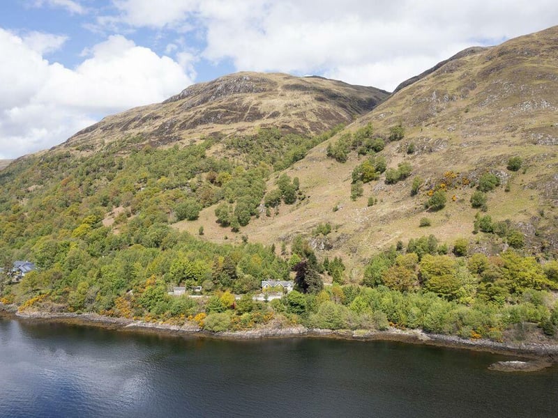 The property sits in a secluded spot close to the shore.