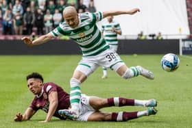 James Hill with one of his many successful tackles on Celtic's Daizen Maeda as Hearts lost at Tynecastle. Picture: SNS
