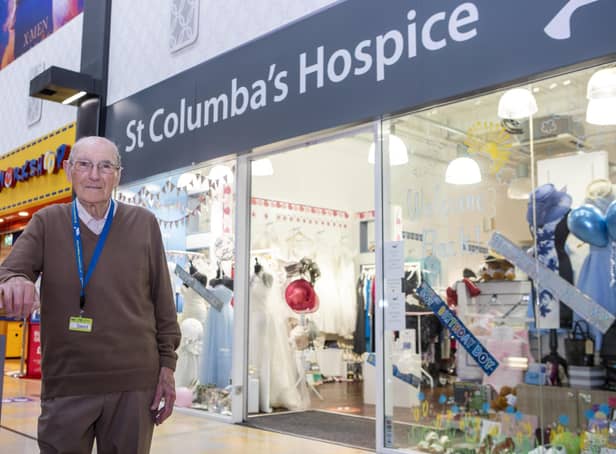 David Flucker celebrated his 100th birthday on June 22, but still went into work at St Columba's Hospice shop the next day as usual
Pic: Katielee Arrowsmith\SWNS