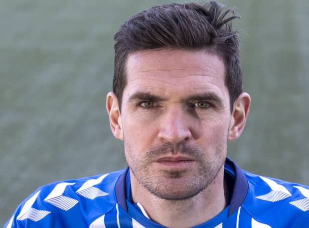 Kyle Lafferty has signed a new contract at Kilmarnock for their return to the Premiership