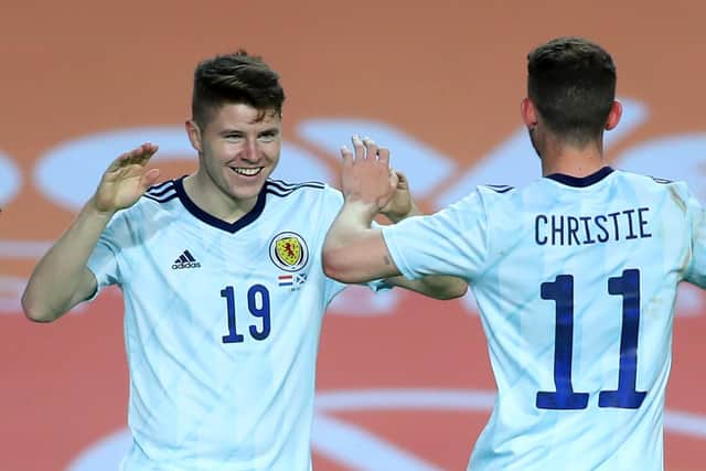 Kevin Nisbet celebrates his first Scotland goal with Ryan Christie